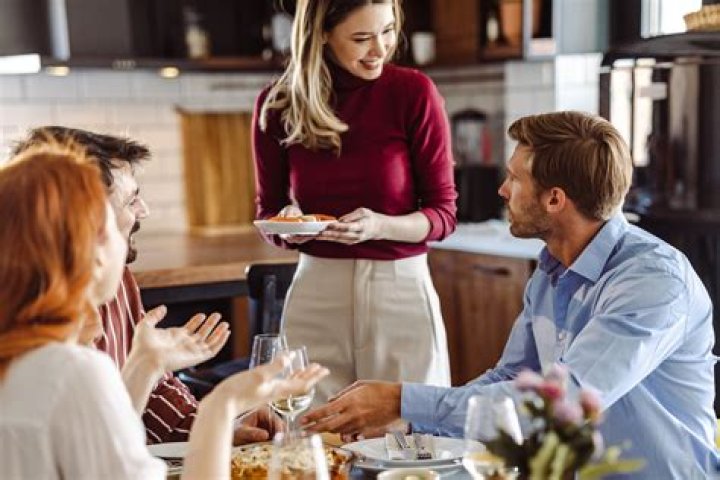 Never Do These 5 Things in Front of Guests, Etiquette Experts Say